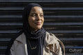 Portrait of young woman wearing hijab