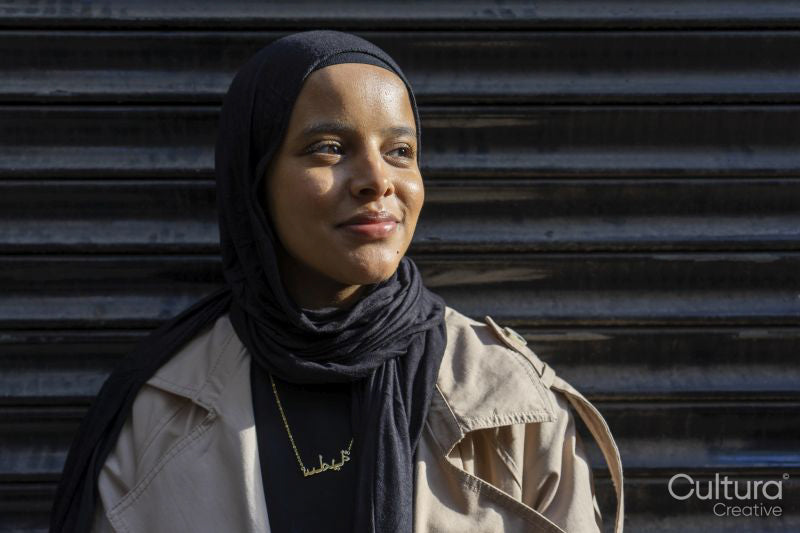 Portrait of young woman wearing hijab