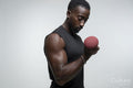 Man training arm with dumbbell