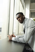 Portrait of young businessman using smart phone