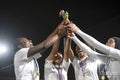 Team of female soccer players celebrating victory
