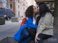 couple kissing outdoors