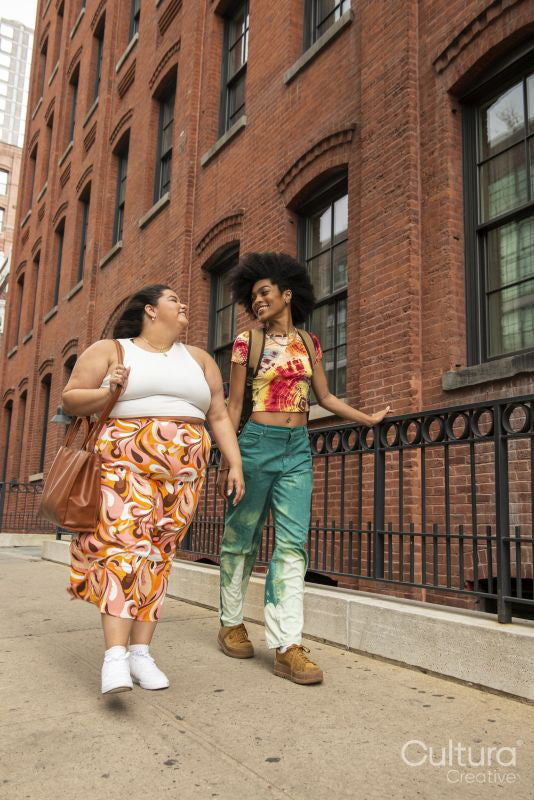 Two women on sidewalk
