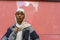 Portrait of young woman wearing hijab
