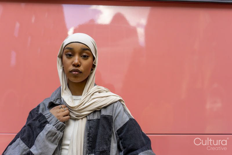 Portrait of young woman wearing hijab