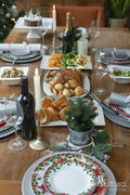 Christmas dinner and decorations on table