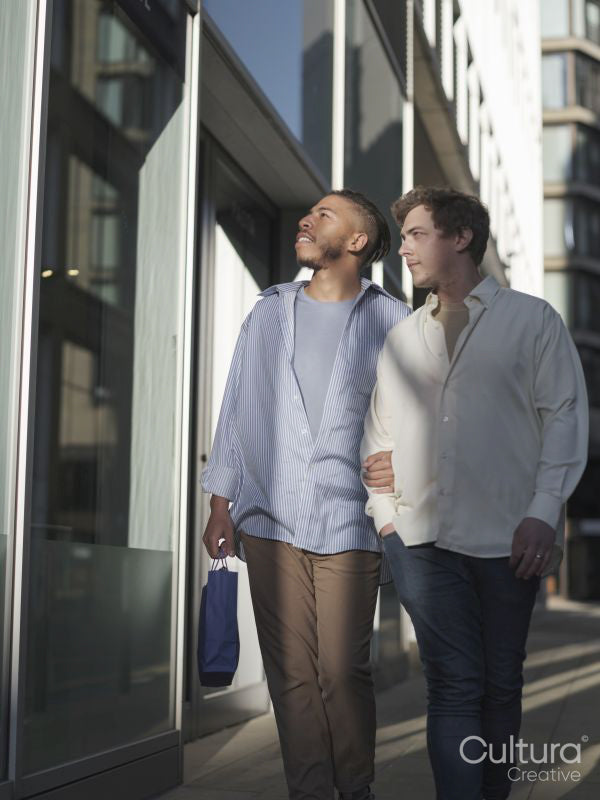 South Yorkshire, Smiling couple walking in city