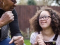 Mother and daughter in backyard