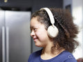 Girl with Down syndrome wearing headphones