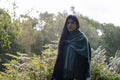 Portrait of woman in landscape