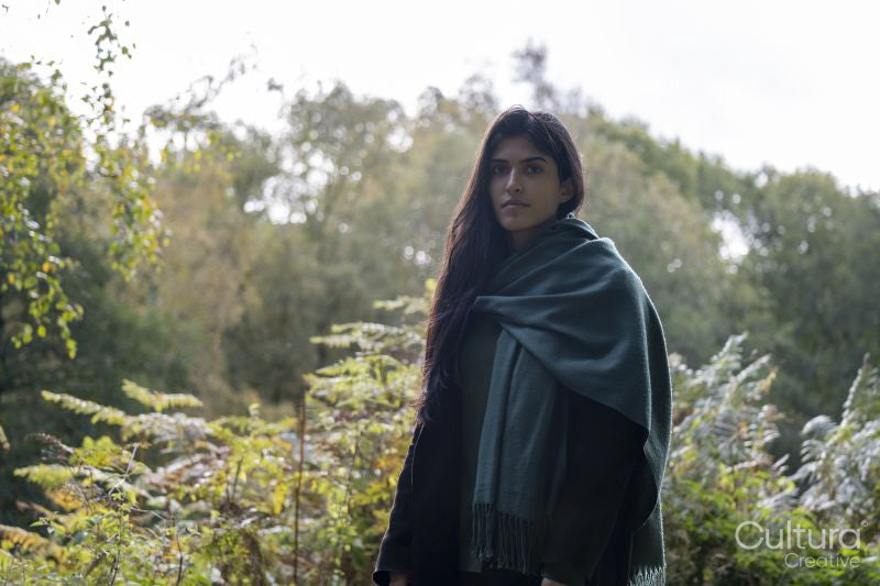 Portrait of woman in landscape