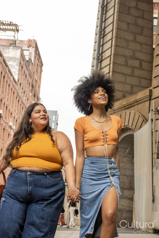 Two young women in street