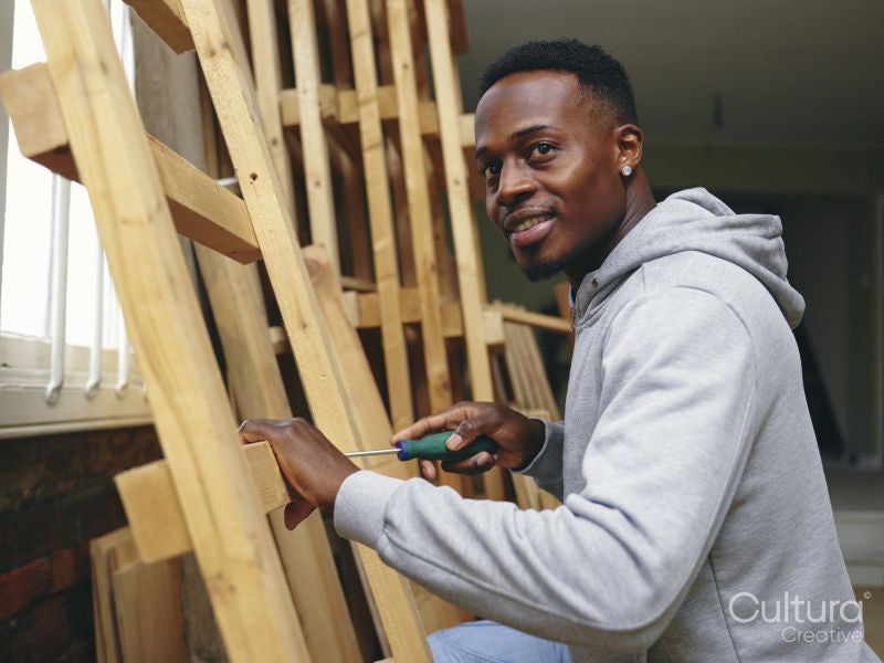 Carpenter using screwdriver