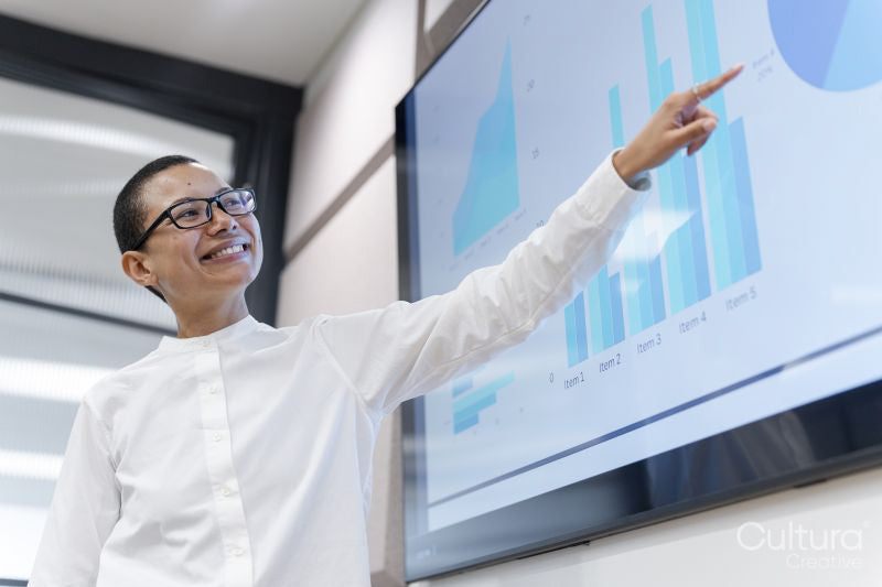 Leader making presentation in office