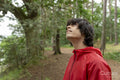 Young man hiking in forest