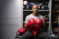 Portrait of mature man in boxing gloves