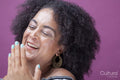 Studio shot of smiling mature woman