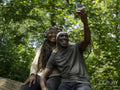 Smiling mature couple taking selfie on hike