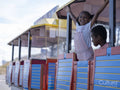 Siblings on land train tourist ride
