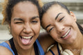 Portrait of female friends making faces
