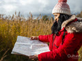 Female hiker using map