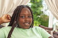 Portrait of smiling girl with braided hair