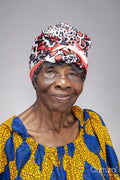 Studio portrait of senior woman wearing a headscarf