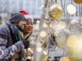 Couple looking at Christmas decorations