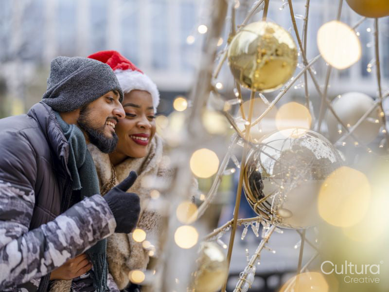 Couple looking at Christmas decorations
