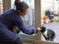 Girl with Down Syndrome stroking cat