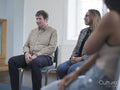 People in group therapy session