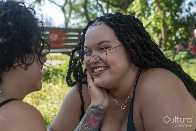 Close-up of smiling couple in park