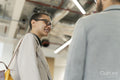 Office workers talking in hallway