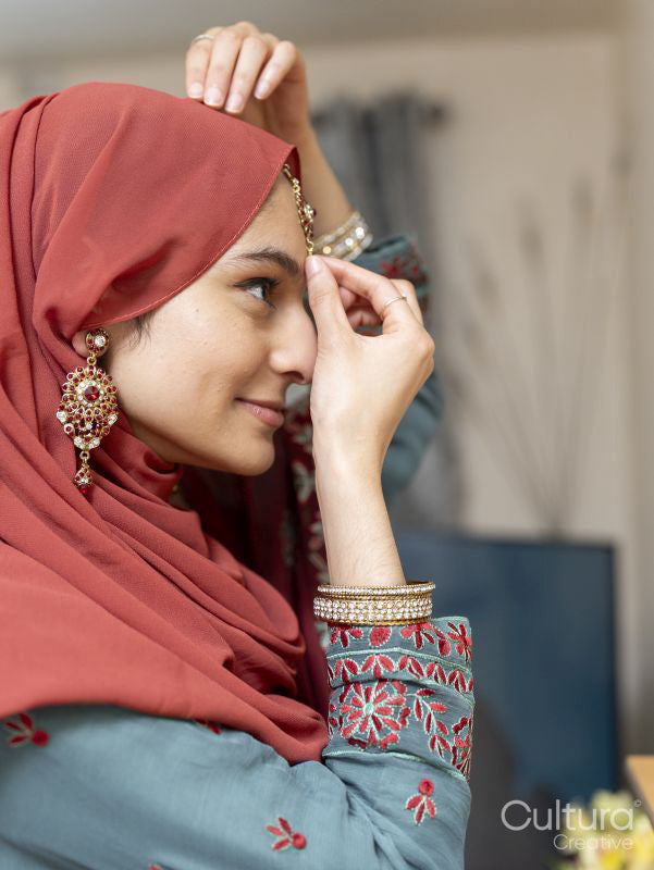 Woman preparing for Ramadan celebration at home