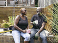 Couple drinking coffee on patio