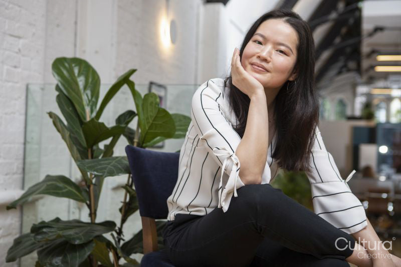 Portrait of smiling woman at home