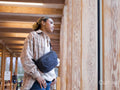 Young woman waiting in hallway