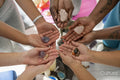 Close-up of women''s hands holding crystals