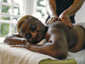 Mature woman having back massage