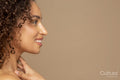 Profile of smiling woman with curly hair