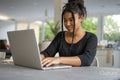 Teenage girl using laptop