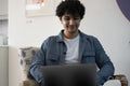 Man working on laptop in office
