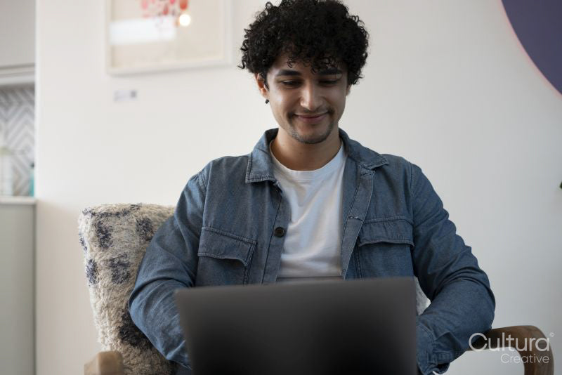 Man working on laptop in office