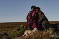 Two senior women with dog in moorland