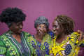Studio shot of senior woman with mature daughters
