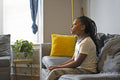 Girl sitting on sofa