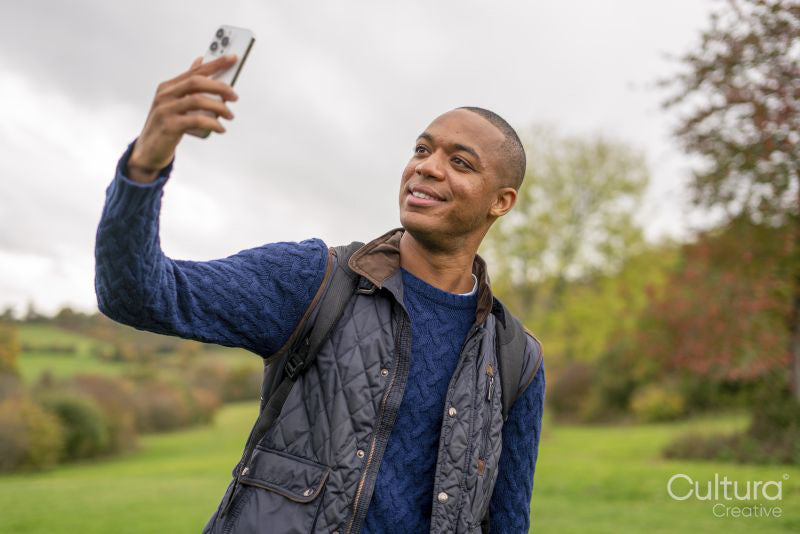 Man taking selfie at nature walk
