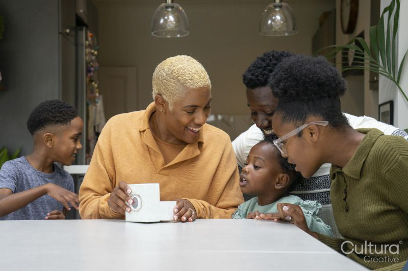 Family with children celebrating birthday