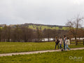 Group of young friends with dog in countryside