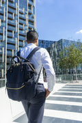 Businessman walking in business district